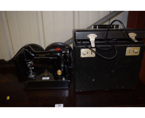A Singer sewing machine - sold as collector's item
