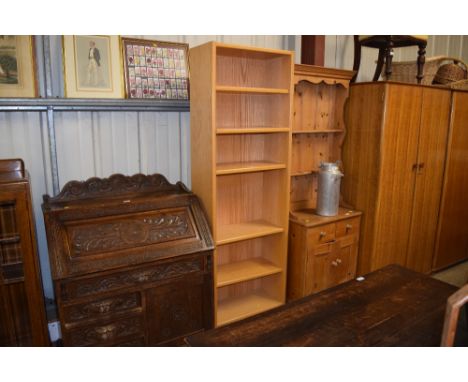 A modern light oak book case with adjustable shelves 