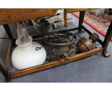 A COPPER AND WROUGHT IRON ART NOUVEAU HANGING OIL LAMP with oil lamp cistern, suspension rods and white glass shade 32cm diam