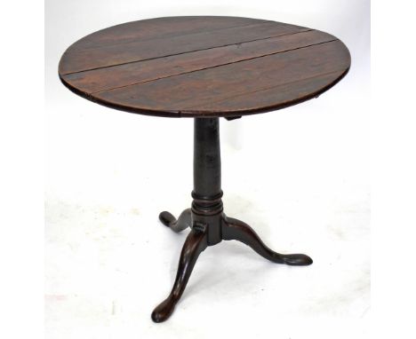 AN OAK TILT TOP TRIPOD TABLE, 81cm diameter