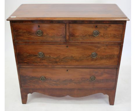 A 19TH CENTURY MAHOGANY CHEST of two short and two long drawers with ring handles and bracket feet 92cm wide x 87cm high 