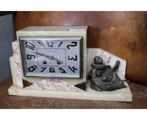 AN ART DECO ONYX AND VEINED MARBLE MANTEL CLOCK of stepped square form, the silvered dial inscribed 'Maison Lecrosnier, Calai