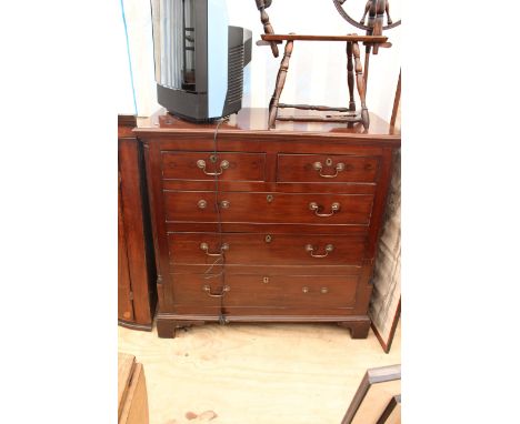 A LATE GEORGE III MAHOGANY CHEST of two short and three long drawers with brass swan neck handles and bracket feet 116cm wide