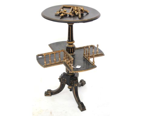A LATE VICTORIAN EBONISED AND PARCEL GILT READING STAND with circular top above a galleried lower tier and splayed tripod (fo