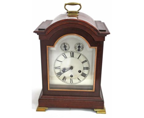 A GEORGIAN STYLE MAHOGANY CASED BRACKET OR TABLE CLOCK the silvered dial with Roman numerals, chime silent and slow/ fast sub