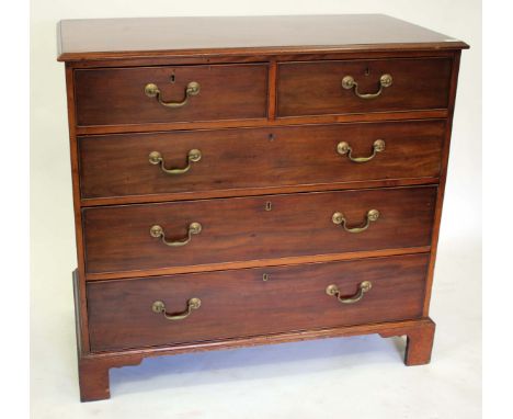 A GEORGE III MAHOGANY CHEST OF TWO SHORT AND THREE LONG DRAWERS with swan neck handles and standing on bracket feet, 120cm wi