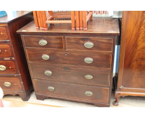 A VICTORIAN MAHOGANY CHEST of two short and three long drawers with brass handles and bracket feet 97cm wide 