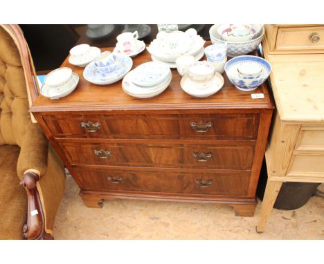 A MAHOGANY CHEST of three long drawers standing on bracket feet 87cm wide x 72cm high 