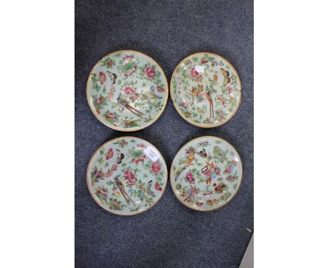 A SET OF FOUR CANTONESE FAMILLE ROSE PLATES decorated with flowers, exotic birds and insects, a Chinese blue and white cup an