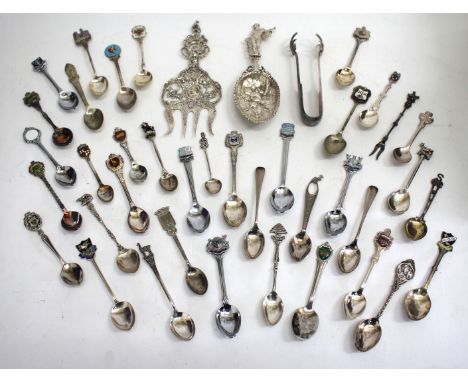 A DUTCH SILVER TOAST/SANDWICH FORK together with a Dutch white metal spoon and a collection of teaspoons 