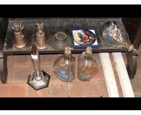 An interesting chrome "Rocket" table lighter, together with ships in bottles, etc. 