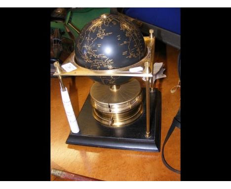 A Royal Geographical Society World Clock - 30cm high CONDITION REPORTThis late twentieth century clock is in ticking order.