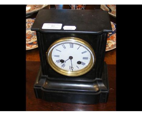 A 20cm high striking Victorian slate mantel clock 