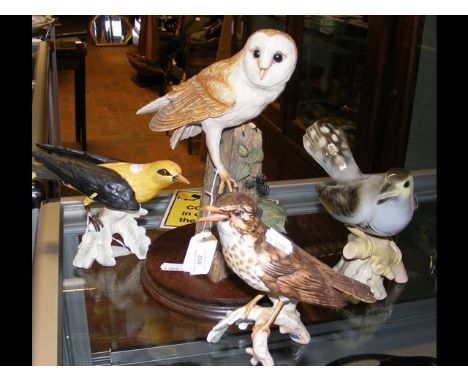 A Goebel model of Golden Loriot, together with three others 