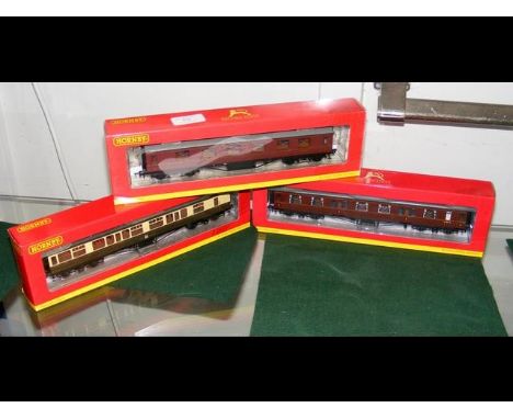 A boxed Hornby First Class Coach, together with two others 