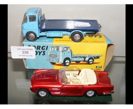 Boxed Corgi Platform Lorry, together with Aston Martin 