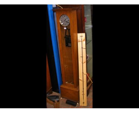 An Electric Synchronome clock of London - 60cm high - with pendulum and weight CONDITION REPORTall seems ok&nbsp;