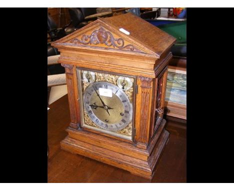 A three train chiming mantel clock in classical oak case - 42cm high - with repeater pull string CONDITION REPORTLocks are fu