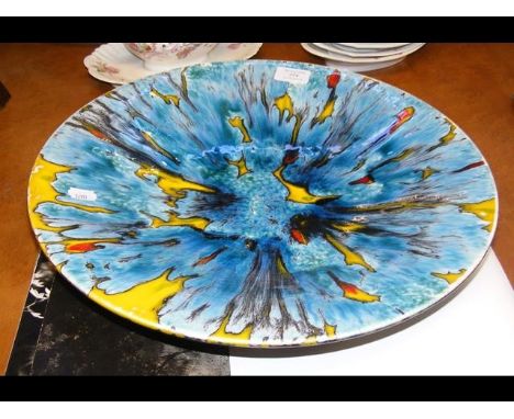 A large Poole Pottery charger by Janice Tchalenko - 42cm diameter CONDITION REPORTCrazing to glaze. Marked to base with dolph