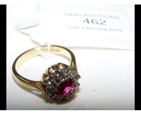 An 18ct gold ruby and diamond ring CONDITION REPORTsize N