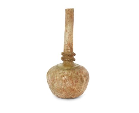 To Be Sold With No ReserveA greenish glass globular bottleIran, 12-13th century,On plain base, the body moulded with a loose 