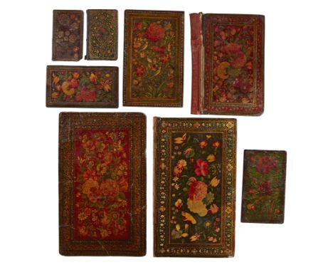 Property from an Important Private CollectionTwo lacquered papier mache bindings and five papier mache coversQajar Iran, 19th