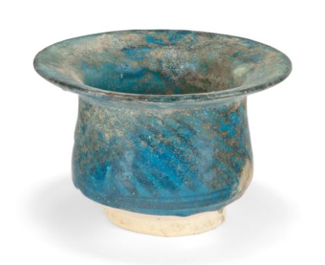  A Group of Important Works - To be Sold Without ReserveAn intact Raqqa ware pottery basin,Near East, 13th century,On a foot 