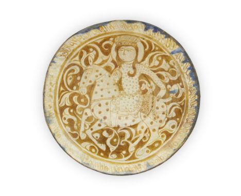 To Be Sold With No ReserveA large lustre and cobalt blue pottery dish,Central Iran, 11th century and later,On short foot, wit