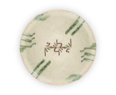 To Be Sold With No ReserveA Nishapur green-splash pottery bowl,Iran, 9th-10th centuryOn plain base, the shallow rounded body 