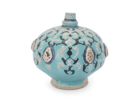 To Be Sold With No ReserveA Kashan turquoise blue and black moulded pottery bottle flask base, Iran, 14th century,on short sp