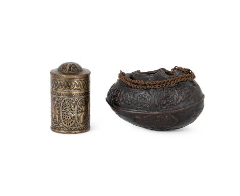 A small Qajar coco-de-mer begging bowl (kashkul) and an engraved brass inkwellIran, 19th centurythe kashkul in the form of a 