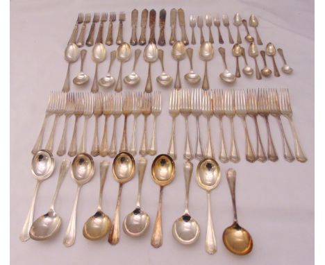 A quantity of silver plated flatware to include knives, forks and spoons