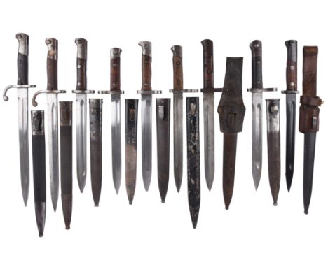 A collection of nine various knife bayonets, in scabbards, comprising: two Brazilian model 1908, a Turkish model 1935, a Yugo