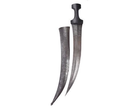λ A massive Persian dagger (jambiya), curved double edged watered steel blade 23 in. with swollen point and broad fullers for
