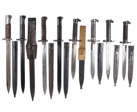 Four Czech VZ-24 bayonets, characteristic inverted blades, wooden grips, steel scabbards, one with leather frog; together wit