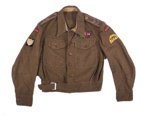 A scarce Second World War Polish 1940 pattern battle dress blouse, with Polish buttons and chevrons to the shoulder straps, f