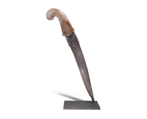 An Indian dagger (khanjar), slightly re-curved wootz blade10.5 in. with swollen point and shallow fullers forming a medial ri