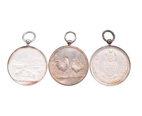 Three silver agricultural prize medals, each with engraved award details and framed with suspension rings: Manchester &amp; L