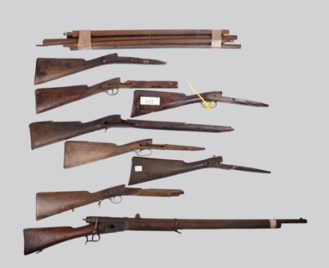 A large quantity of antique firearm components, including: the major parts of a Swiss Vetterli bolt action service rifle, muz