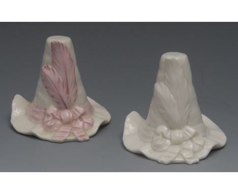 A Royal Worcester candle snuffer, as a lady's feathered hat with pink ribbon tied ribbon, 7cm high, printed crown and circle 