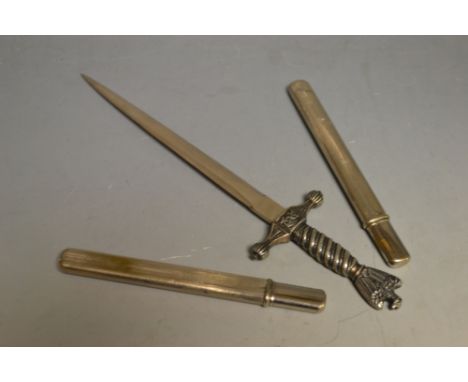 A novelty letter knife, as a German Imperial naval dagger; a travelling pocket knife and fork