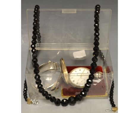 A silver hunter pocket watch; a silver hinged bangle; a single strand of graduated faceted jet type beads (3). 