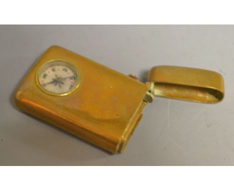 An early 20th century century brass novelty vesta case, set with a compass

