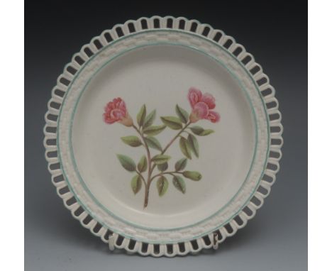 An 18th century cream ware Botanical plate, painted with pomegranate blossom, basket weave border, outlined in turquoise, tit