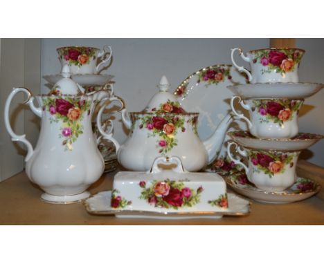 A Royal Albert Old Country Roses six-setting tea service, comprising teapot, hot water jug, cups, saucers and side plates, bu