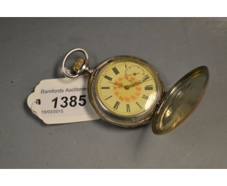 A continental 800 silver Hunter pocket watch, white dial, Roman numerals, red Arabic 24 hour centre, subsidiary seconds, Sust