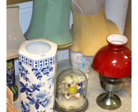 Glass dome and cover; a 20th century table lamp; other table lamps; hexagonal umbrella stand (6)