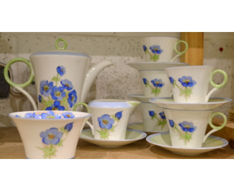 A Shelley Pottery 12148 pattern tea service of five, decorated with blue flowers, printed marks