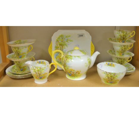 A Shelley Pottery 13370 pattern tea service decorated with a spring daffodil and woodland view, printed marks