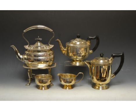 Silver plate - a Viners four piece tea set comprising teapot, water jug, milk and sugar, cast with fruiting vine of flowers; 